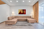 Modern kunstwerk "Chromatische Synergie" met rode en gele tinten, formaat 120x80cm, in een hedendaagse woonruimte.